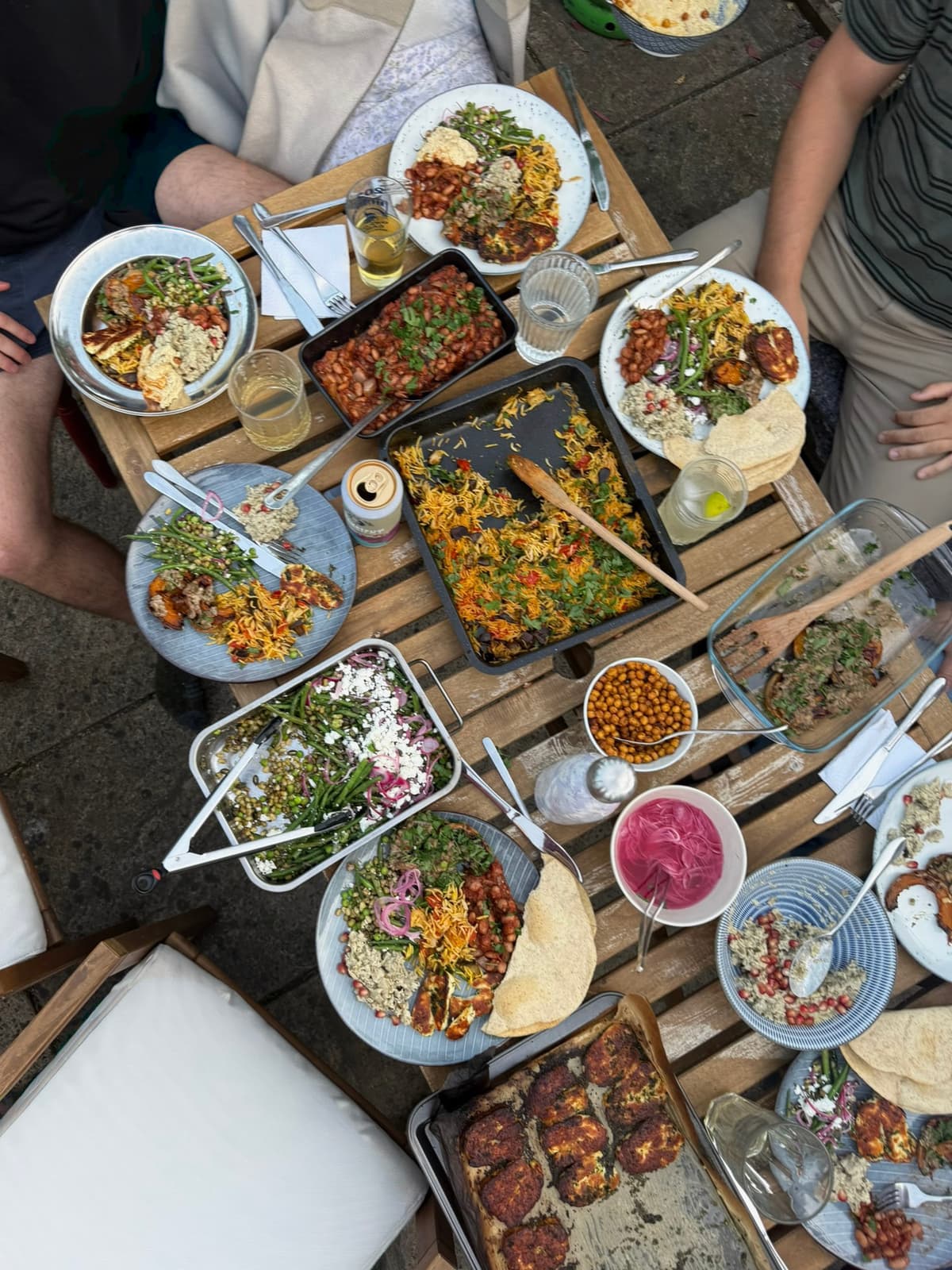 Spread of Middle Eastern dishes at a Pass the Plates supper club evening