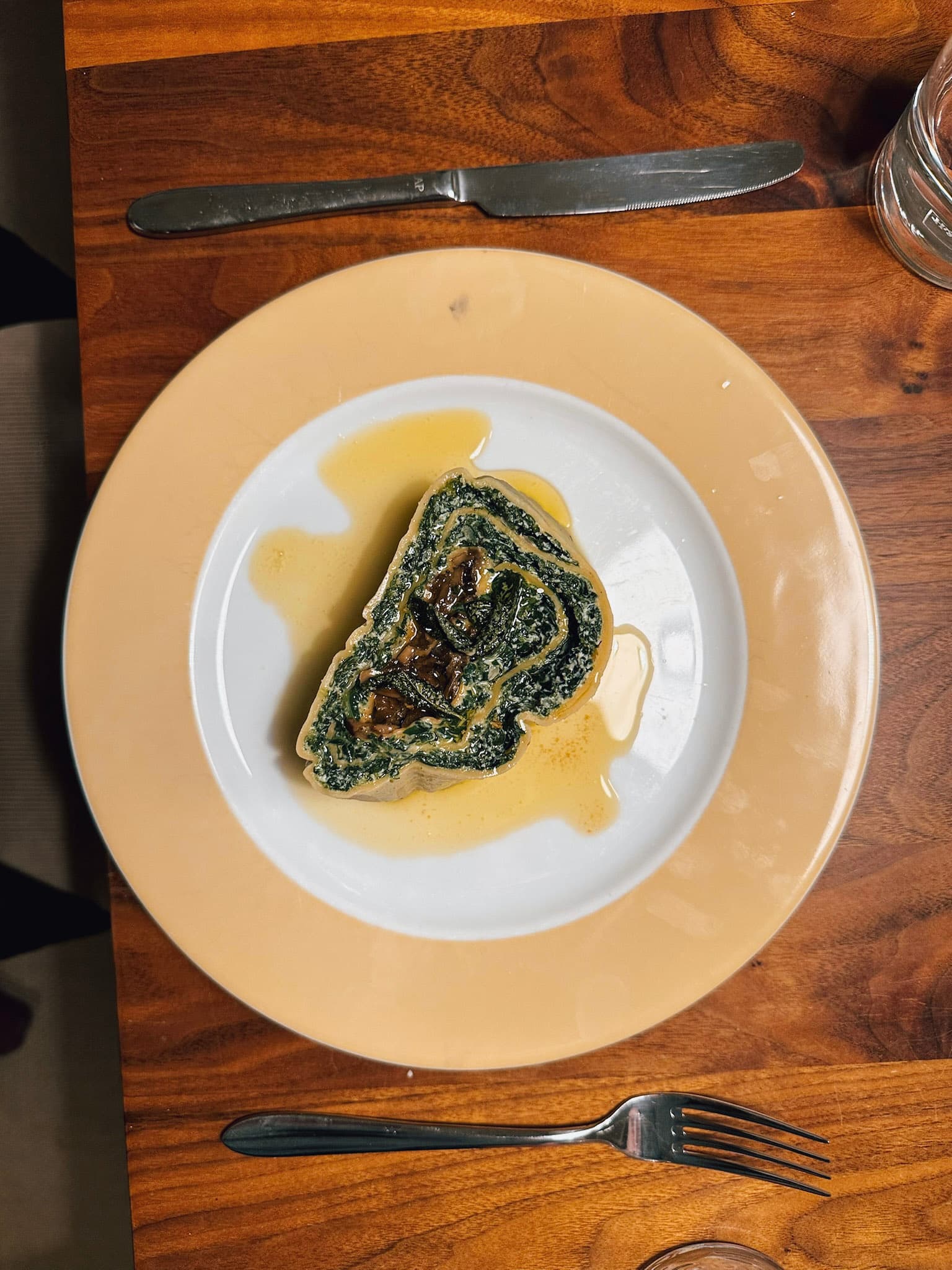 Freshly made spinach and ricotta rotolo being served at dinner