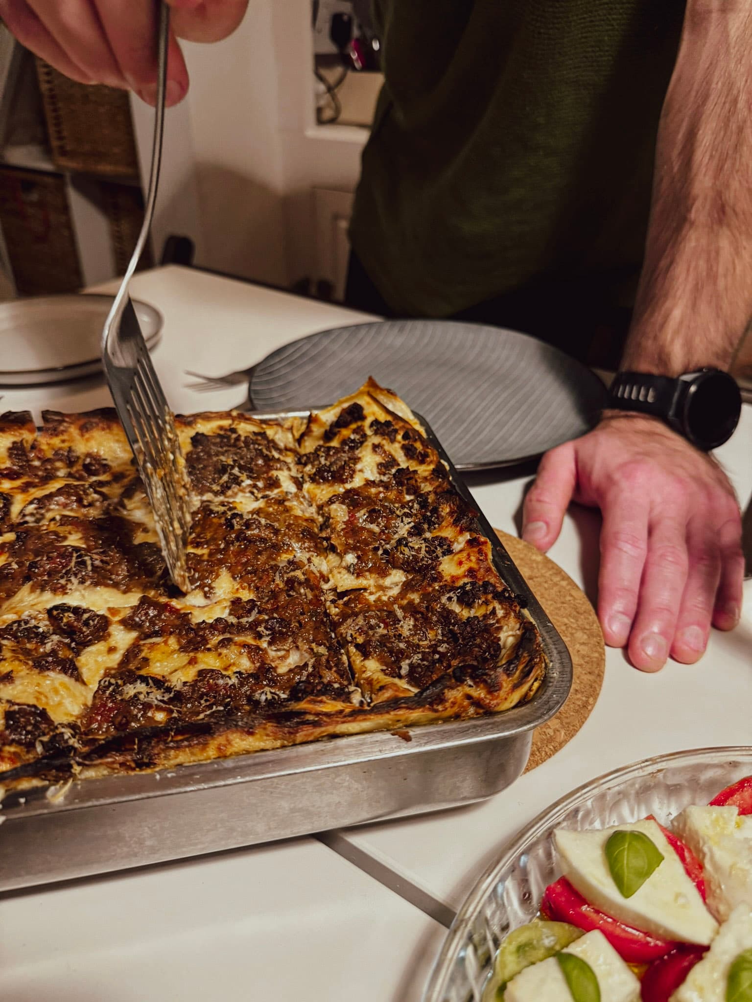 Big joyful group around the long table