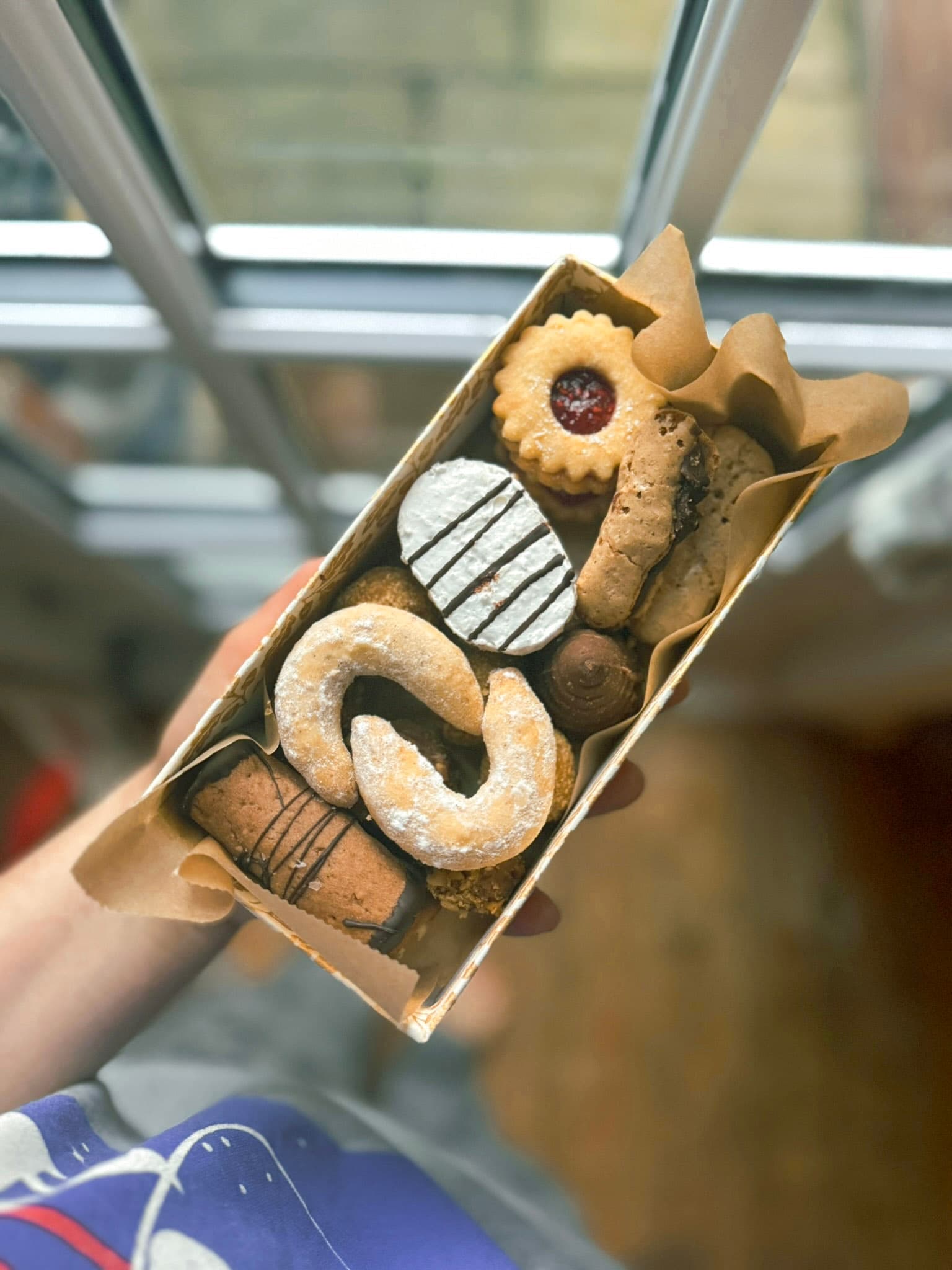 Vera beaming holding tray of strawberries